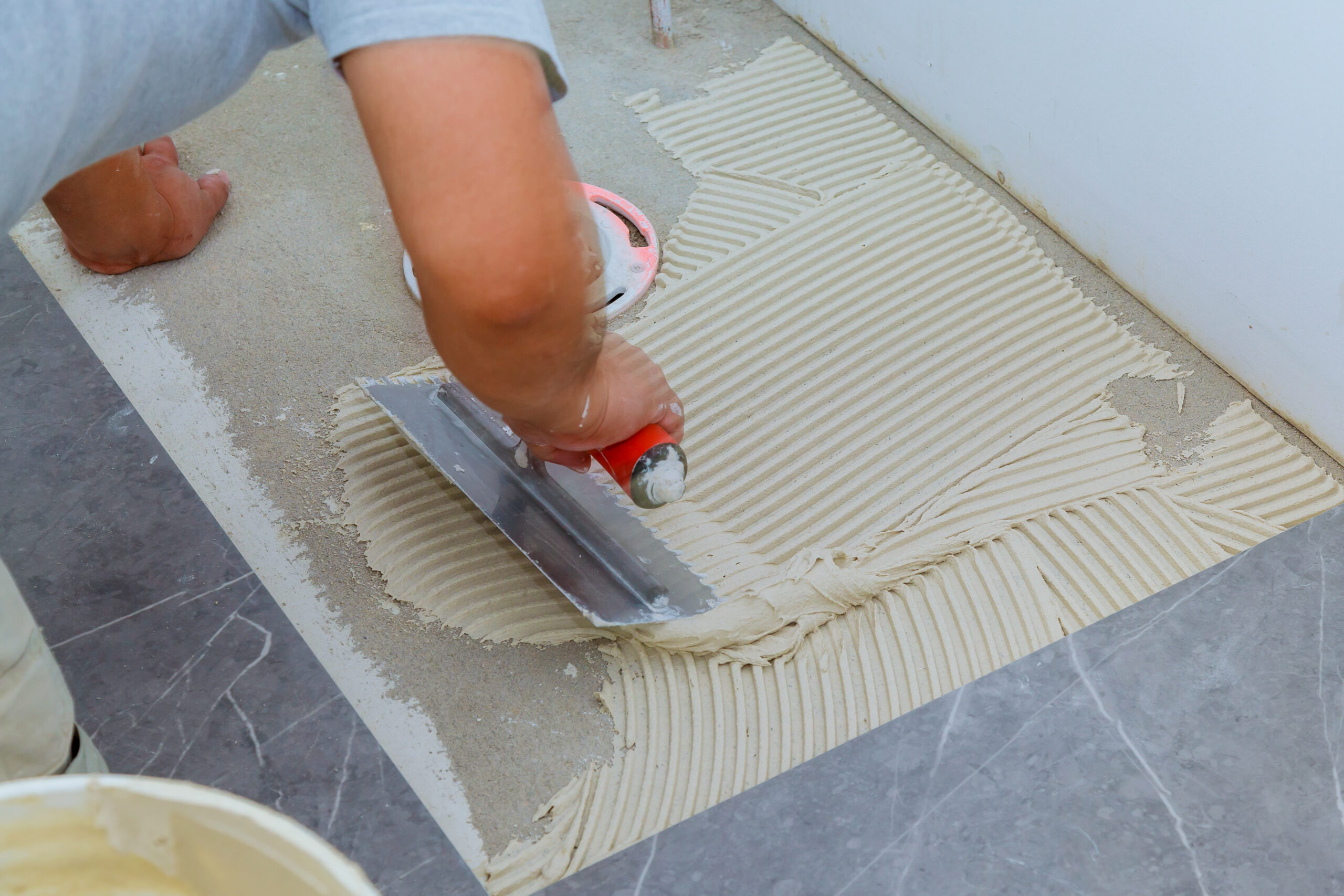 ceramic-tiles-tools-tiler-floor-tiles-installation-home-improvement-renovation-scaled